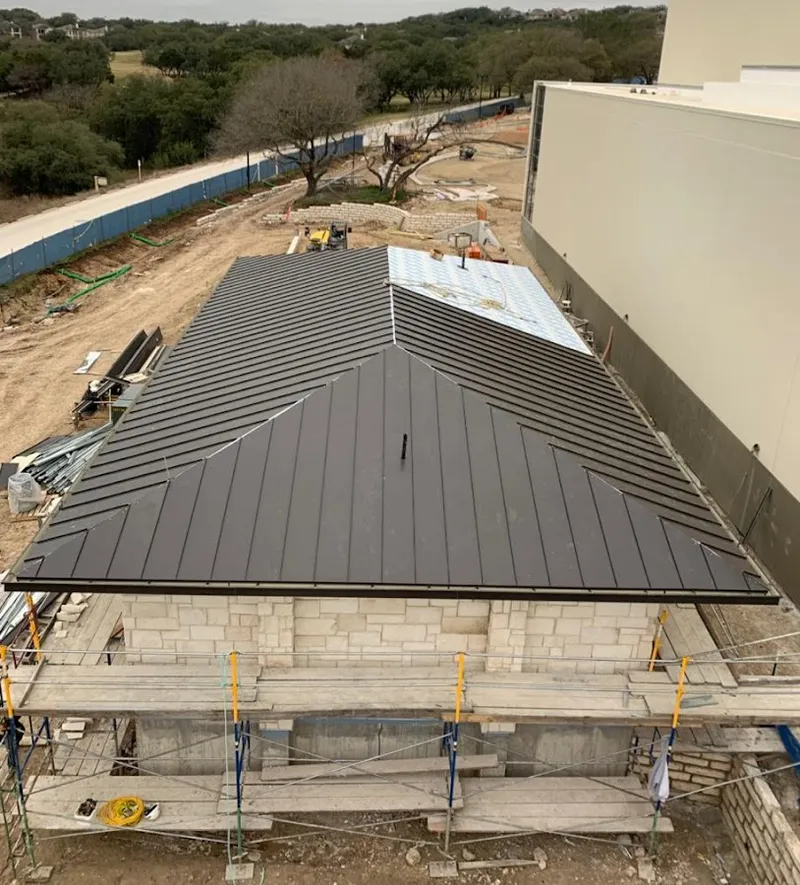 Metal roof new construction with scaffolding in Millington